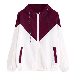 White and burgundy jacket.